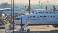 Air Canada makes 'difficult decision' to cut management jobs