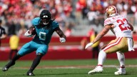 NFL fines Christian McCaffrey $23,186 for lowering his helmet into Jaguars' Devin Lloyd