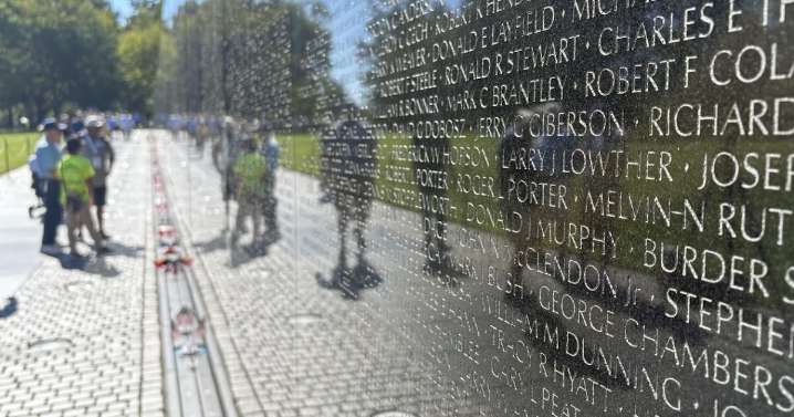 Etched in stone, carried in hearts: Vietnam veterans visit memorial wall during Honor Flight