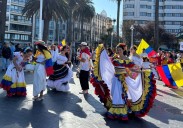Color y ritmos latinos en Gijón por el Día de la Hispanidad