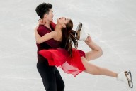 Skating body investigates toy missile seen with Chinese ice dancers