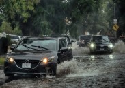 Rare October storm brings heavy rain and threat of mudslides to Southern California