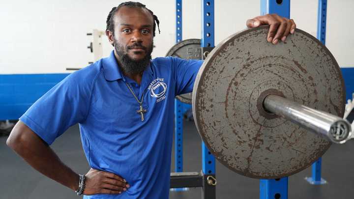Former student leads players inside Brandywine High School's weight room