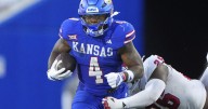 Kansas defense stymies UCF to escape with 27
