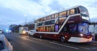 Edinburgh driver rushed to hospital as car smashes into back of bus on busy road