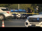 Witnesses describe gunman’s shootout with police at busy intersection in west Charlotte