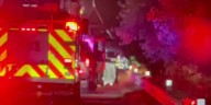 Crews lift car out of Rock River
