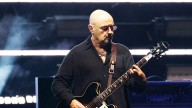 Oasis guitarist Paul Arthurs steps away from reunion tour for cancer care
