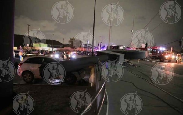 Analizan multa por caída de letrero de supermercado