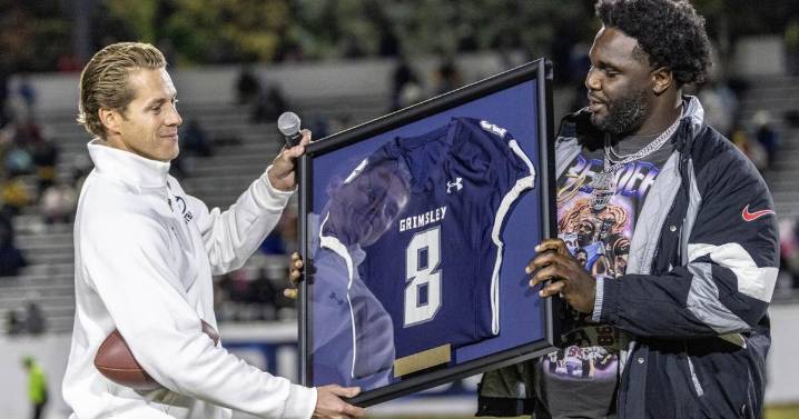 DJ Reader honored by Grimsley with jersey retirement
