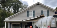Water truck crashes into house in Prince George County