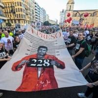 Thousands protest on 1st anniversay of Spain's deadly floods
