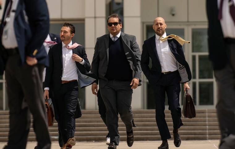 Trump commutes George Santos’ fraud sentence