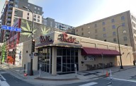 Bouncer charged in shooting outside Minneapolis strip club