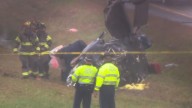 Plane crashes onto a Massachusetts highway, killing 2 on board and hurting 1 motorist