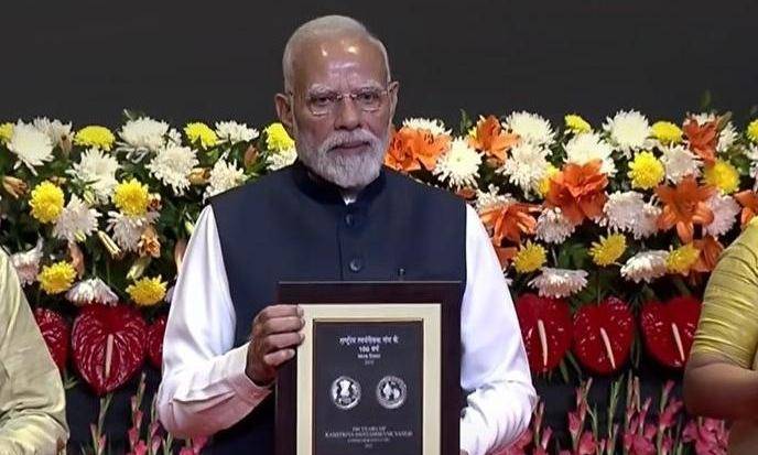RSS at 100: Modi unveils coin with first-ever depiction of Bharat Mata on Indian currency