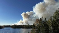 More homes evacuated as wildfire burns in Kings County