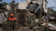 Death toll from torrential rains in Mexico rises to 64 as search expands