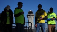 Isolated flight delays may spread as air traffic controllers go without pay during shutdown