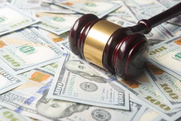 Three Louisiana officials indicted in state contract bidding schemes