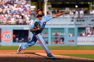 Dodgers advance to NLCS after Kerkering's costly error in 11th inning beats Phillies