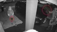 Shocking CCTV emerges as four masked men armed with guns, machetes break into Sydney home with two children inside
