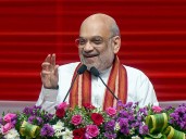 Amit Shah commemorates 100 years of RSS
