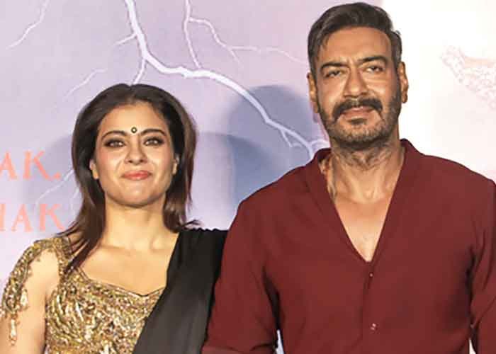 Ajay Devgn & Kajol twin in green during the Maha Navmi celebration