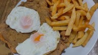 Bodegón en Buenos Aires: la mítica parrilla que mantiene vivo el asado durante 24 horas