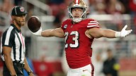 Resilient 49ers overcome injuries, led by McCaffrey's 201 yards, to defeat Falcons