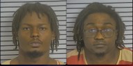 2 men arrested for staging armed robbery, HPD says