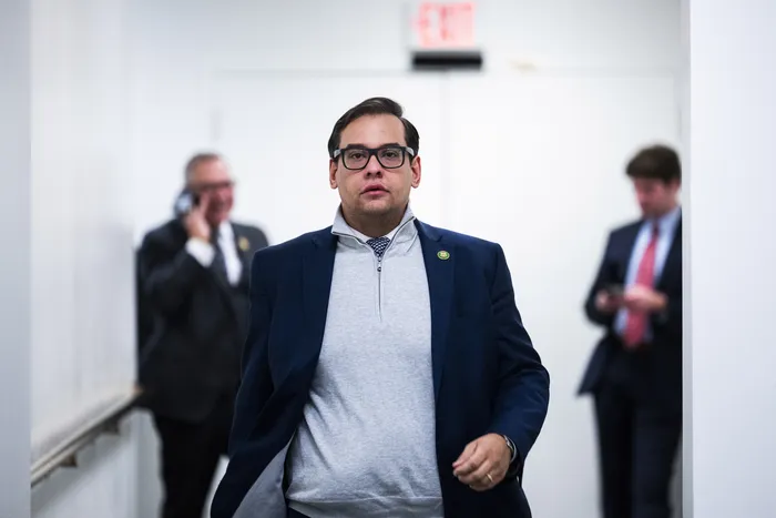 Trump says he's commuting George Santos' 7-year sentence for fraud