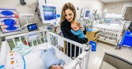 Identical twins thriving after undergoing life