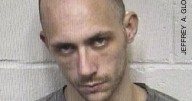 Man arrested for setting home on fire