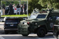 Gunman shoots two Miami cops, barricades inside house