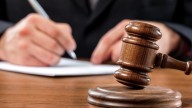 Twins brothers indicted in head stomping case