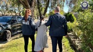 23-year-old Sydney woman charged after allegedly running online accounts sharing extremist content 'glorifying martyrdom'