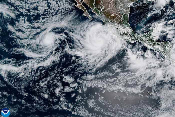 Hurricane Priscilla strengthens to a Category 2 storm as it runs along the Pacific coast of Mexico