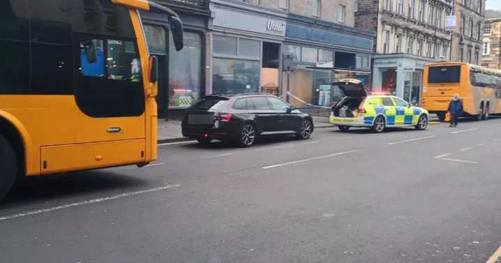 Woman rushed to hospital after being hit by bus in Edinburgh city centre