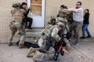 Official defends use of tear gas in Chicago and says agents on immigration sweeps have cameras