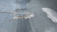 Southwest Bexar County neighborhood calls for action as sinking roads cause vehicle damage