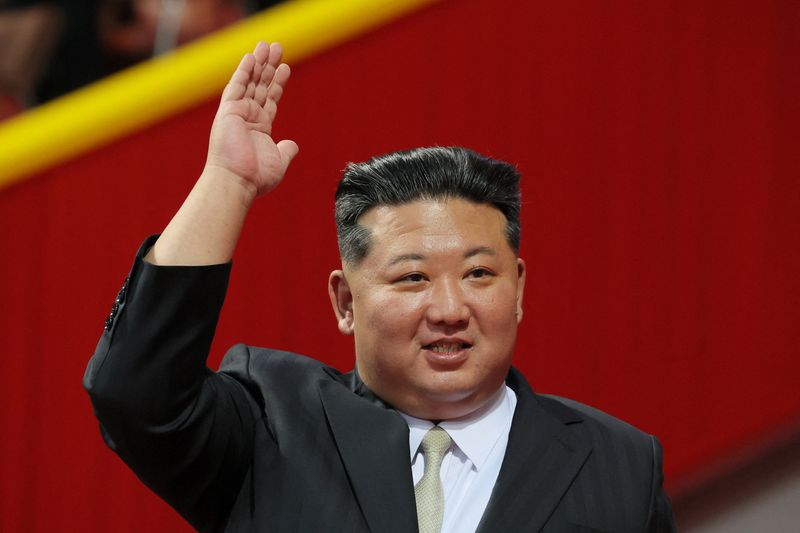North Korea holds military parade, shows off new intercontinental missile