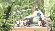 Video: Staff pushes President's chopper after it sinks into new helipad