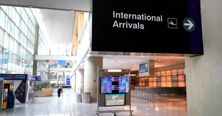 Flight is diverted to Boston after a passenger stabs 2 teens with a fork, authorities say