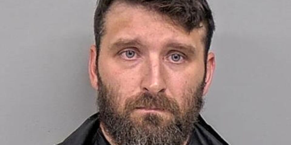 New Albany man accused of climbing ladder to film neighbors in bathroom