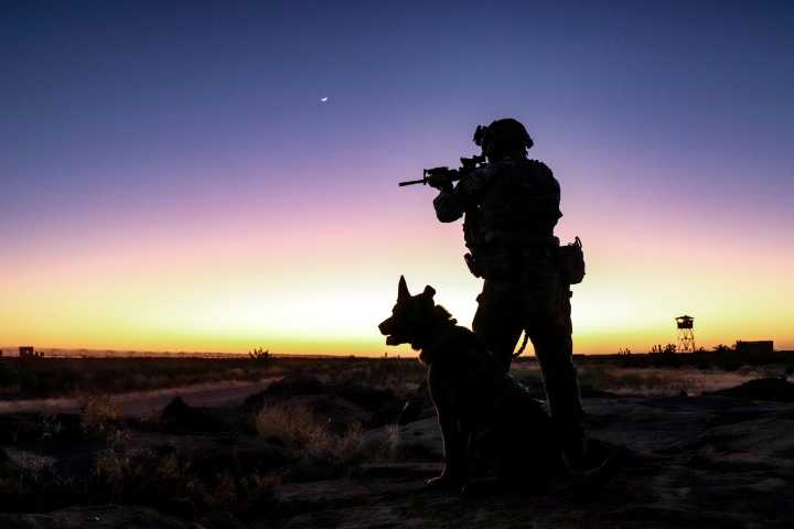 Navy SEAL Sniper JT and his Faithful Labrador Hawkeye