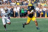 Overheard outside Michigan’s locker room: Hair on fire and brotherly love
