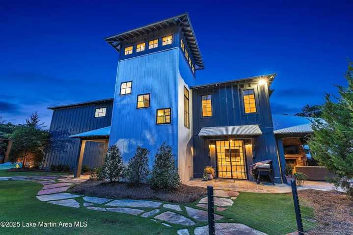 This $3.2M Alabama lake estate features a stunning house and massive ‘party barn’