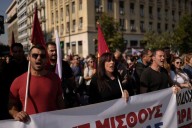 Greece adopts law extending working hours despite protests