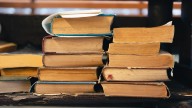 How To Upcycle Old Books Into Charming Fall Decor On A Dime